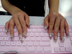 Mine aren't anywhere near this long, but they sure feel like it when I'm typing! -Image by alphabunny_photos
